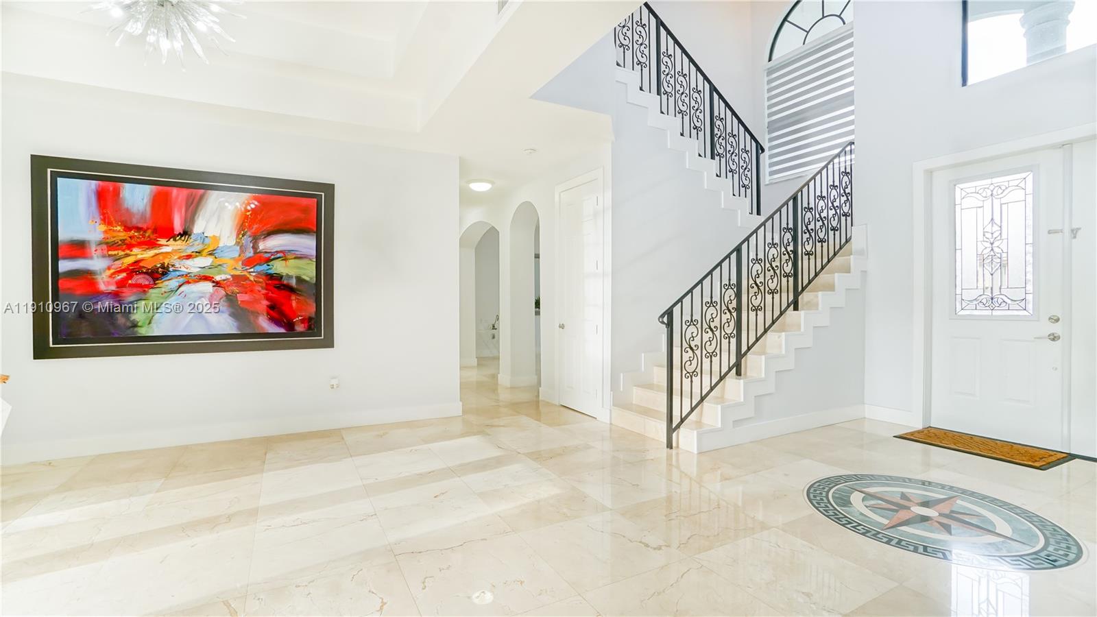 6950 Southwest 97th Avenue Miami, FL 33173 - Photo 6 of 22 a view of entryway and hall with wooden floor