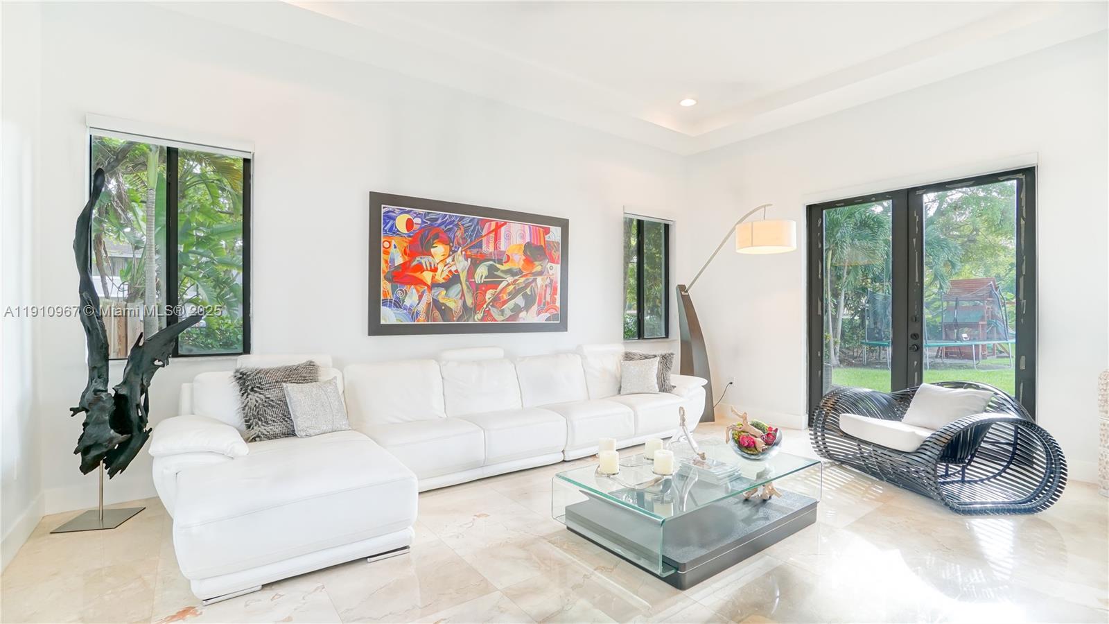 6950 Southwest 97th Avenue Miami, FL 33173 - Photo 7 of 22 a living room with furniture and a large window