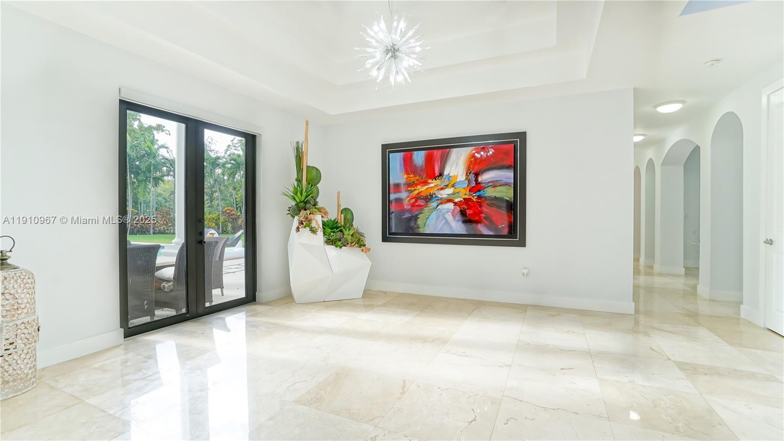 6950 Southwest 97th Avenue Miami, FL 33173 - Photo 8 of 22 a view of painting on the wall