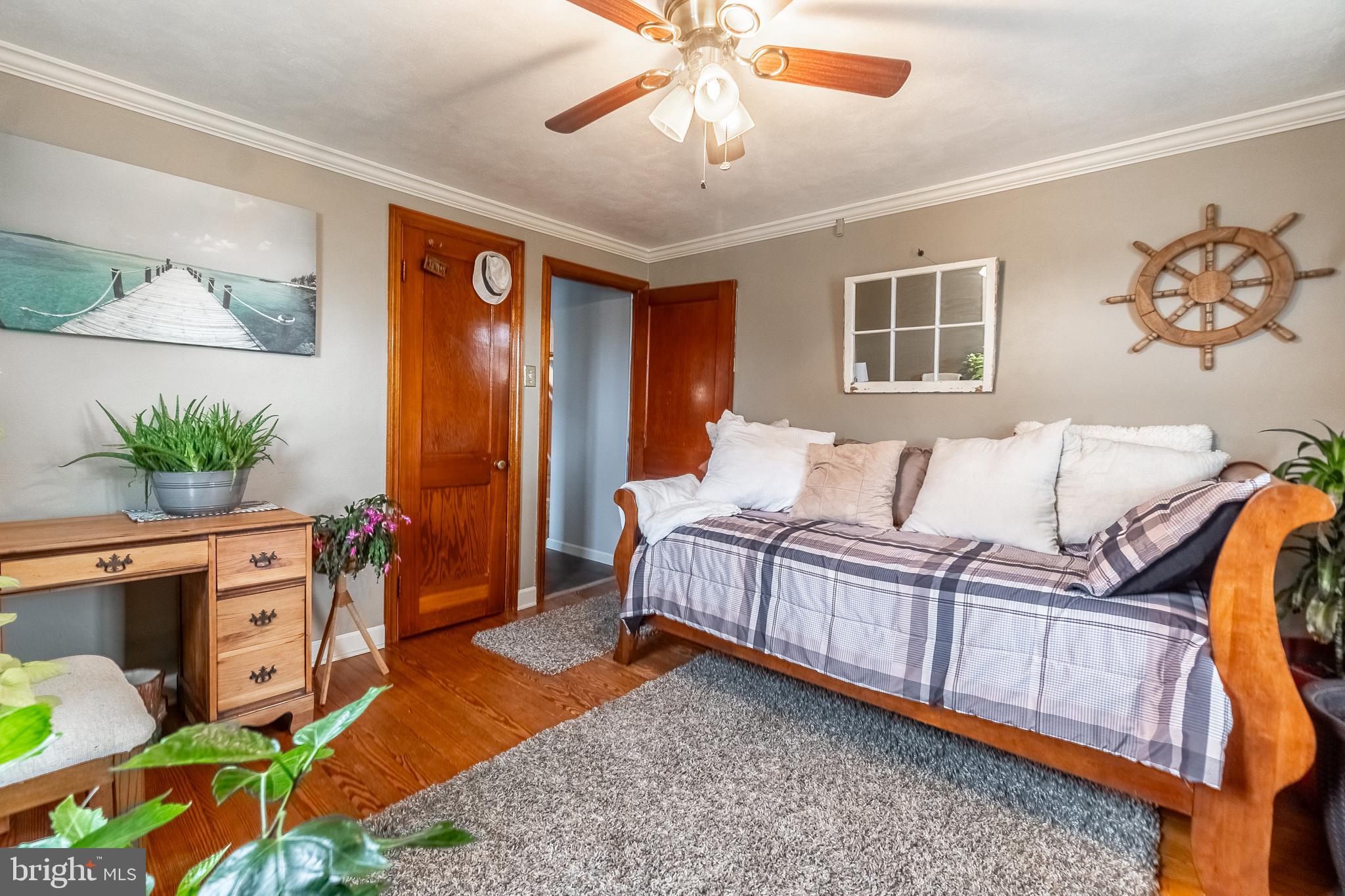 311 Wirt Avenue Hanover, PA 17331 - Photo 13 of 37 a bedroom with a bed and a chandelier