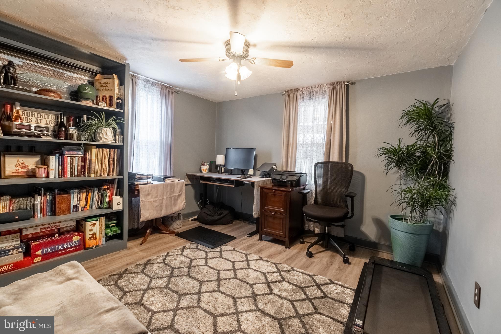 311 Wirt Avenue Hanover, PA 17331 - Photo 15 of 37 a view of a workspace with furniture and a book shelf