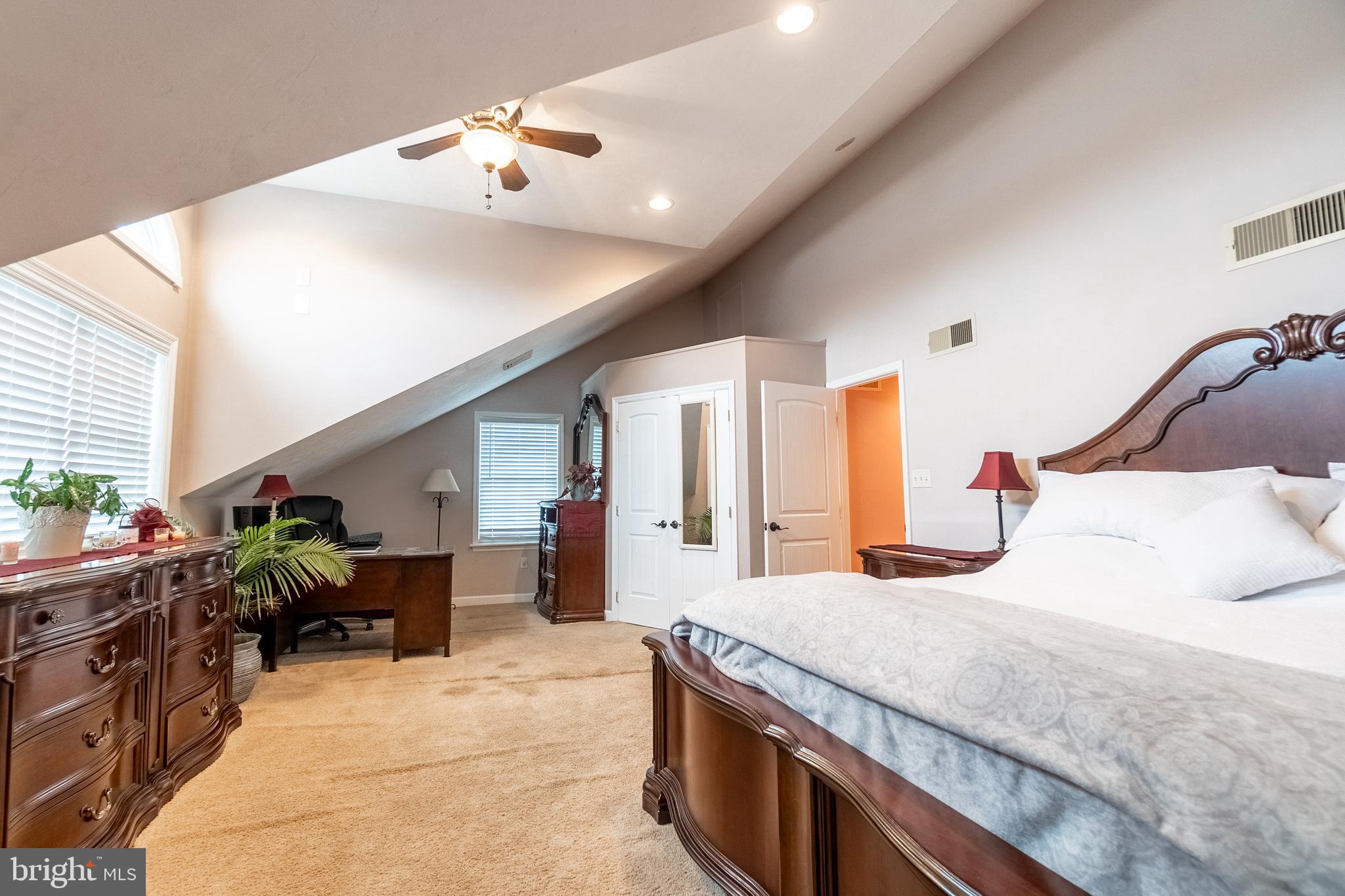 311 Wirt Avenue Hanover, PA 17331 - Photo 19 of 37 a bedroom with a bed and a chandelier