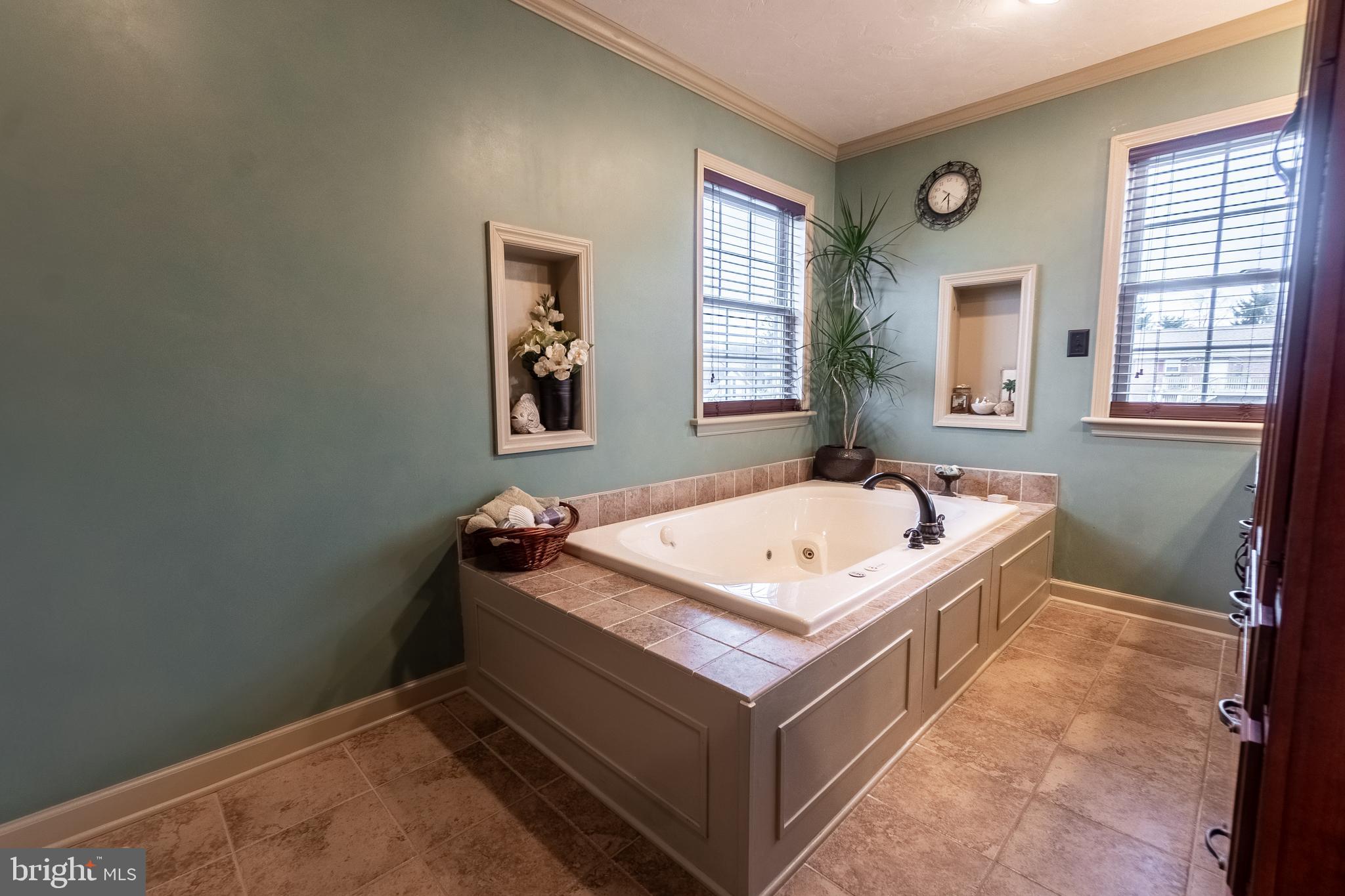 311 Wirt Avenue Hanover, PA 17331 - Photo 22 of 37 a bathroom with a tub a sink and a window