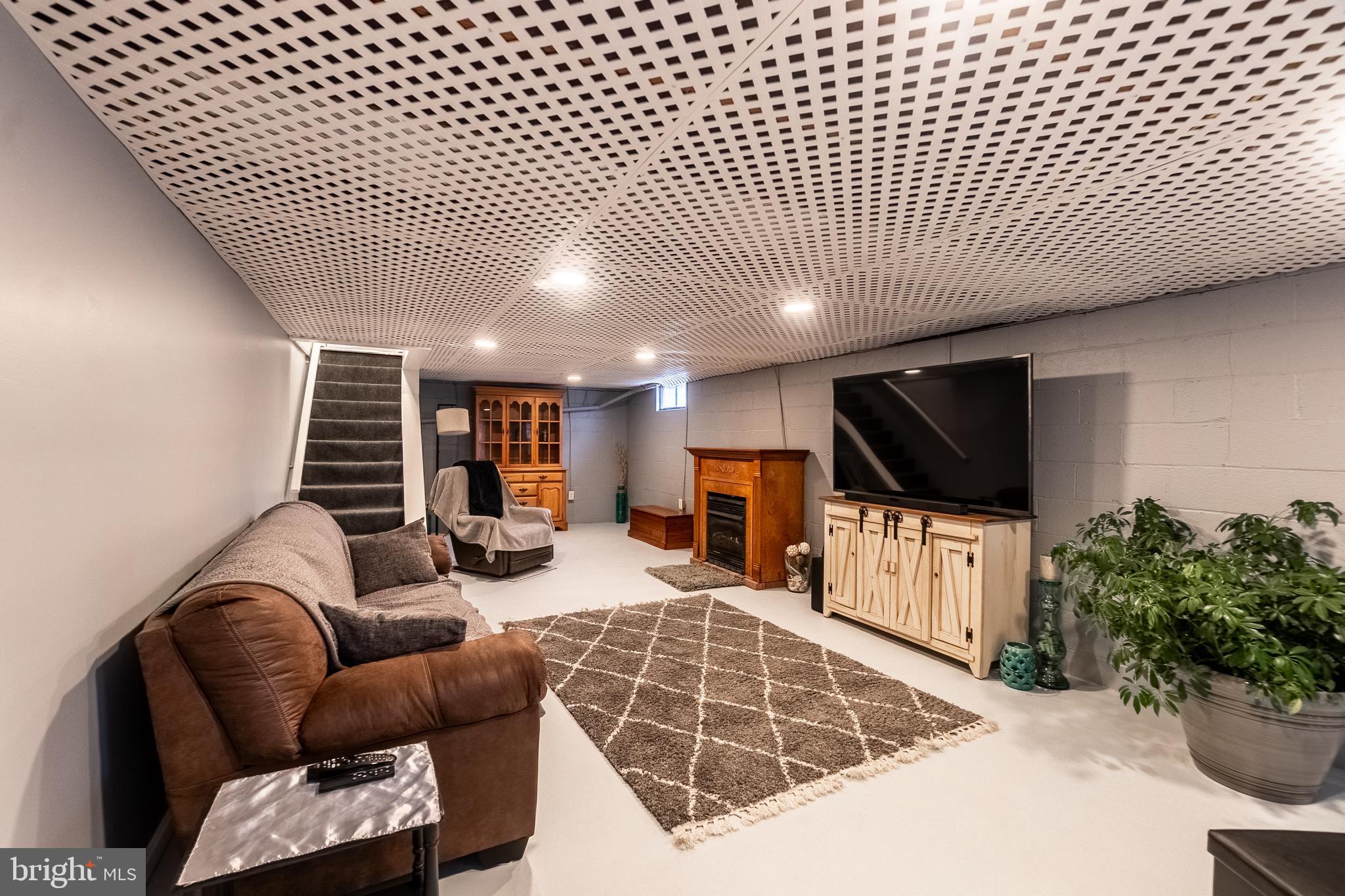 311 Wirt Avenue Hanover, PA 17331 - Photo 26 of 37 a living room with furniture and a flat screen tv