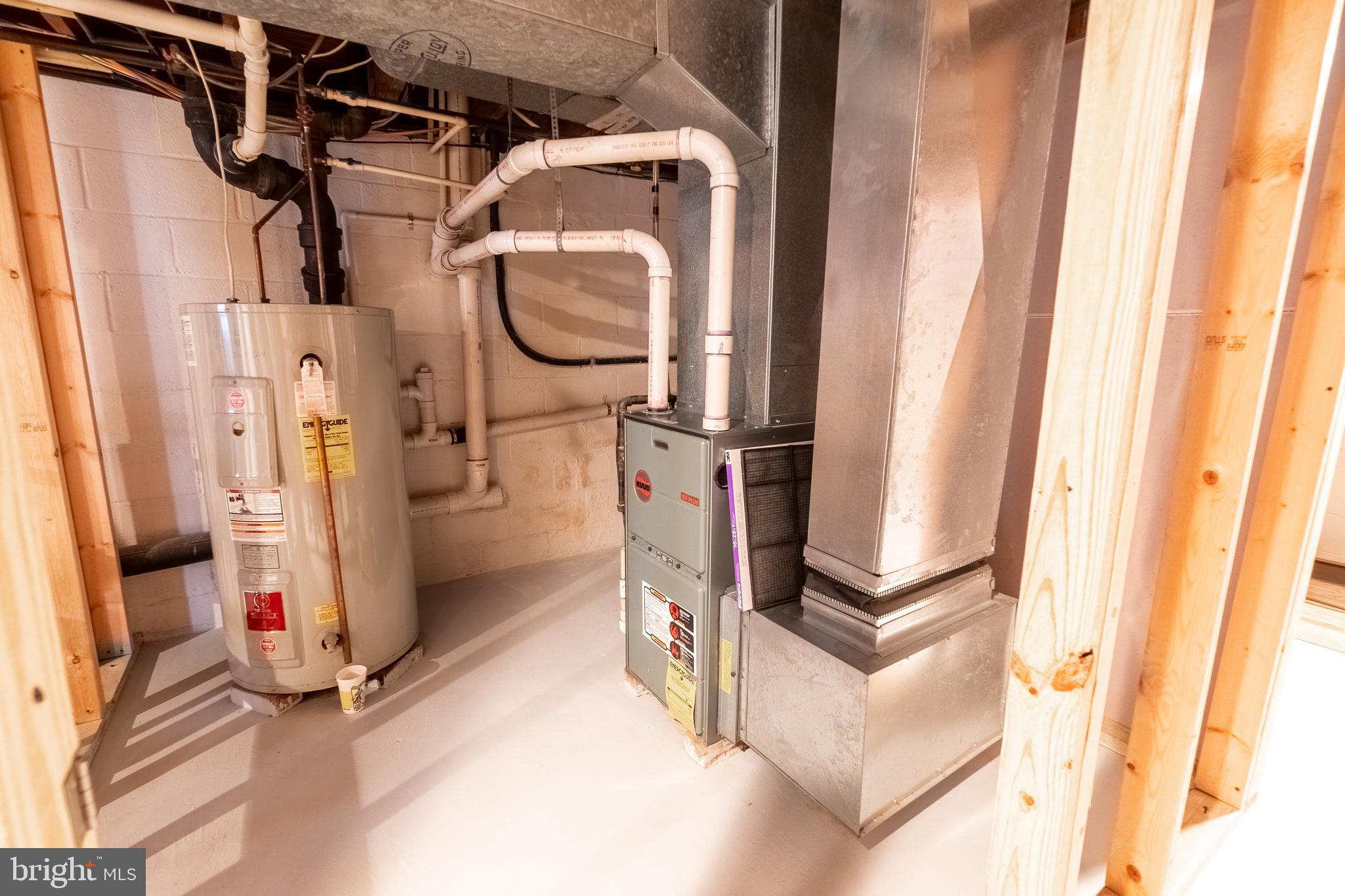 311 Wirt Avenue Hanover, PA 17331 - Photo 28 of 37 a utility room with wooden floor and cabinets