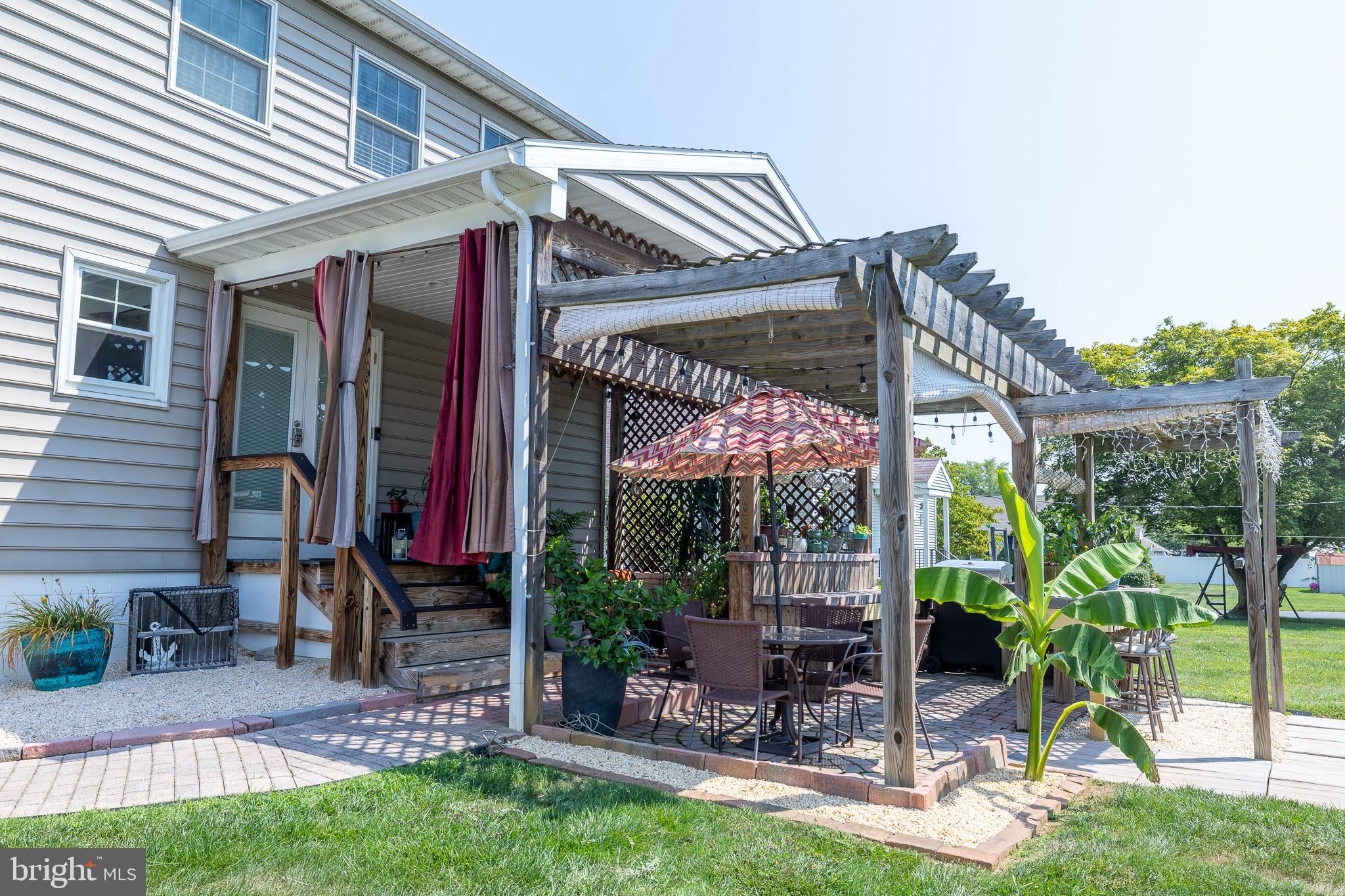 311 Wirt Avenue Hanover, PA 17331 - Photo 30 of 37 a view of a chair and table in patio with a backyard