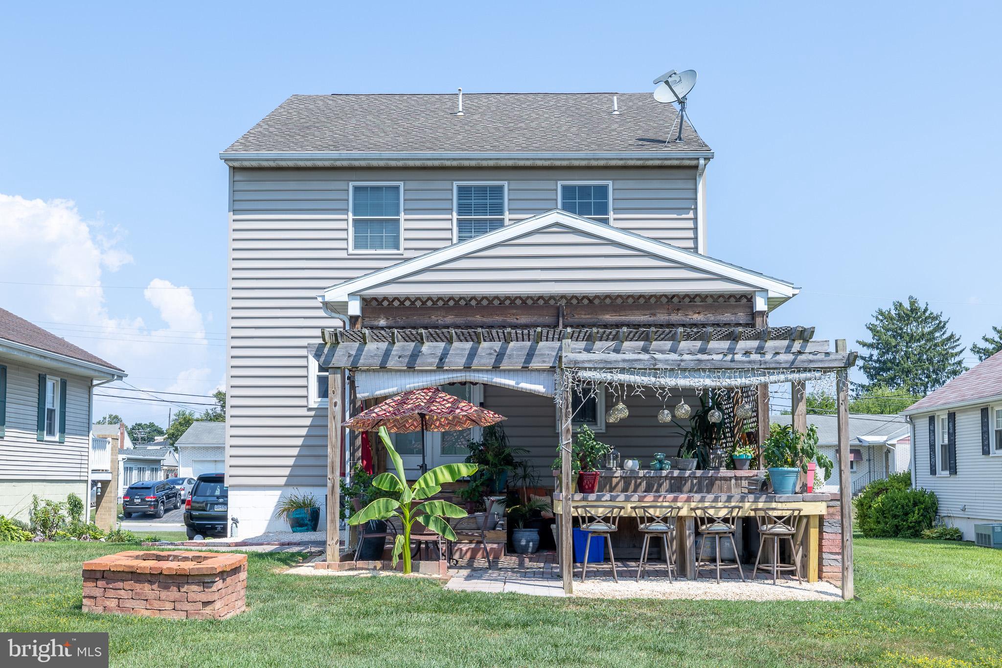 311 Wirt Avenue Hanover, PA 17331 - Photo 3 of 37 a front view of house with yard and outdoor seating