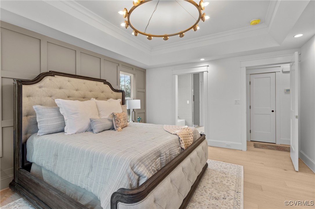 4792 Bell Road Powhatan, VA 23139 - Photo 21 of 27 a bedroom with a bed and a chandelier