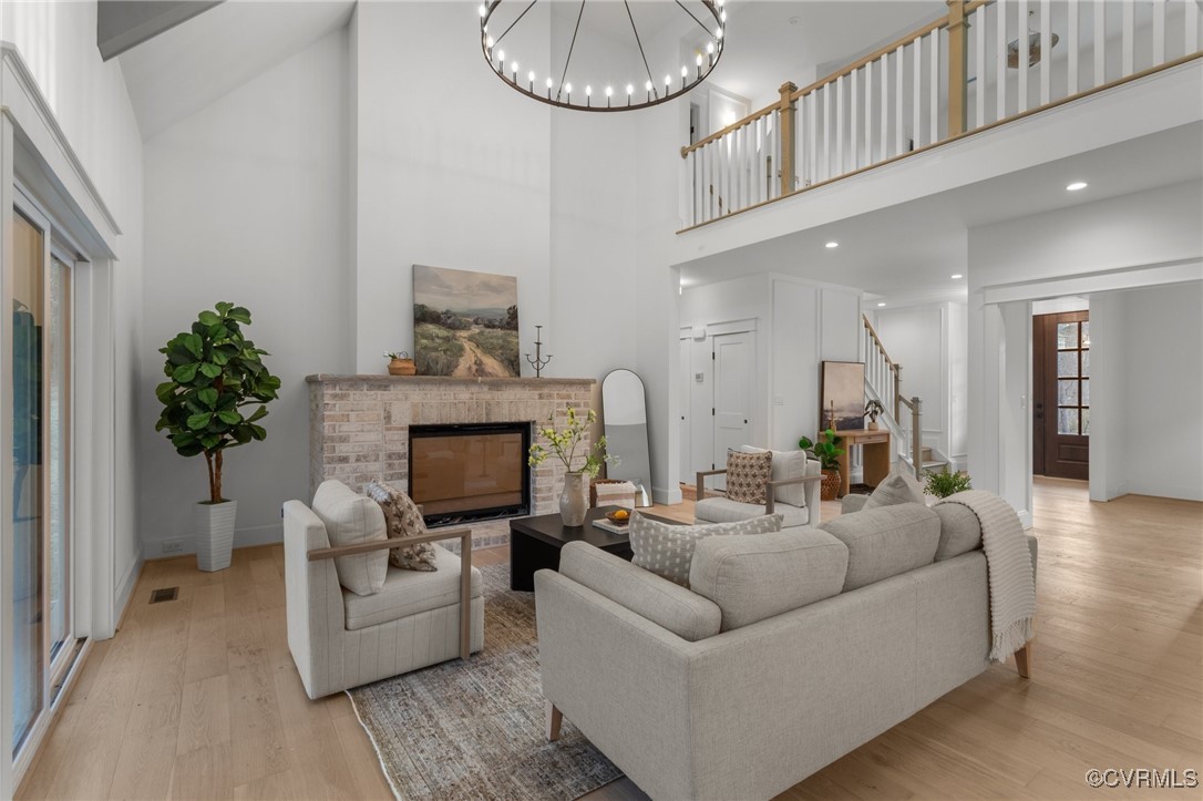 4792 Bell Road Powhatan, VA 23139 - Photo 6 of 27 a living room with furniture and a fireplace