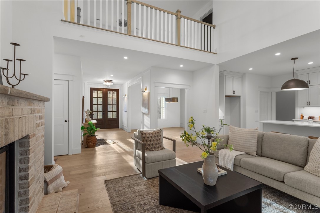 4792 Bell Road Powhatan, VA 23139 - Photo 8 of 27 a living room with furniture and a fireplace