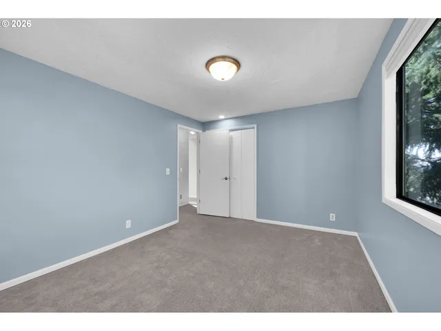 a bathroom with a sink mirror toilet and bathtub