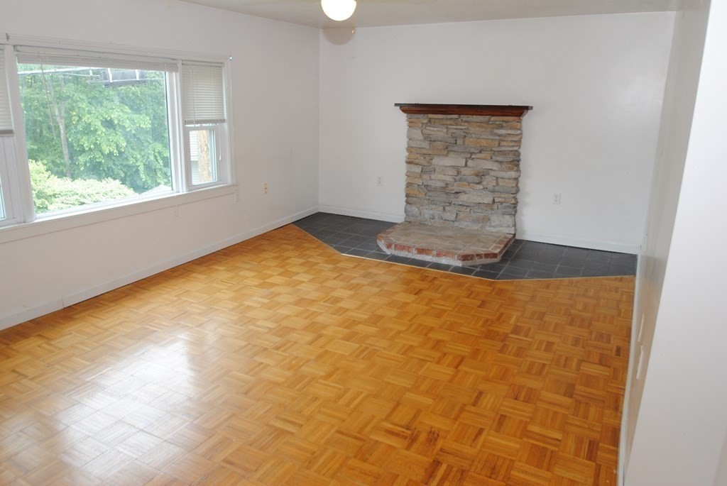 16 Hartness Road, Unit D Sutton, MA 01590 - Photo 4 of 16 a view of empty room with floor to ceiling window