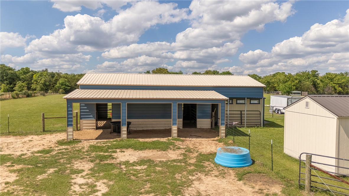 10976 Whiterock Road Bremond, TX 76629 - Photo 28 of 42 a view of a house with a backyard