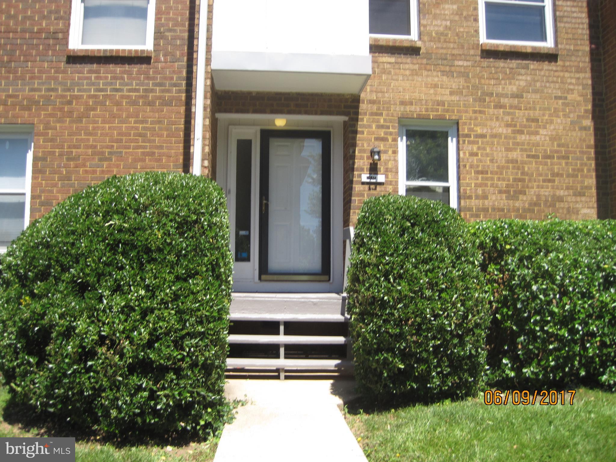 9640 Canterbury Riding, Unit 178 Laurel, MD 20723 - Photo 1 of 15 a house view with a garden space