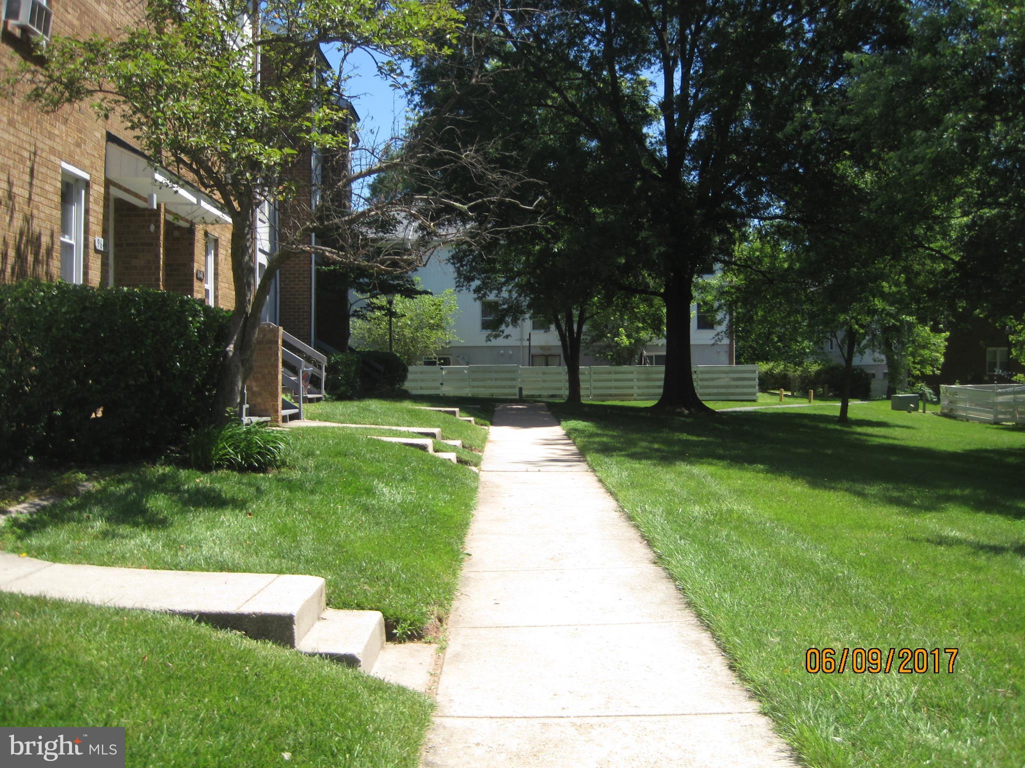 9640 Canterbury Riding, Unit 178 Laurel, MD 20723 - Photo 2 of 15 a view of a backyard with a garden