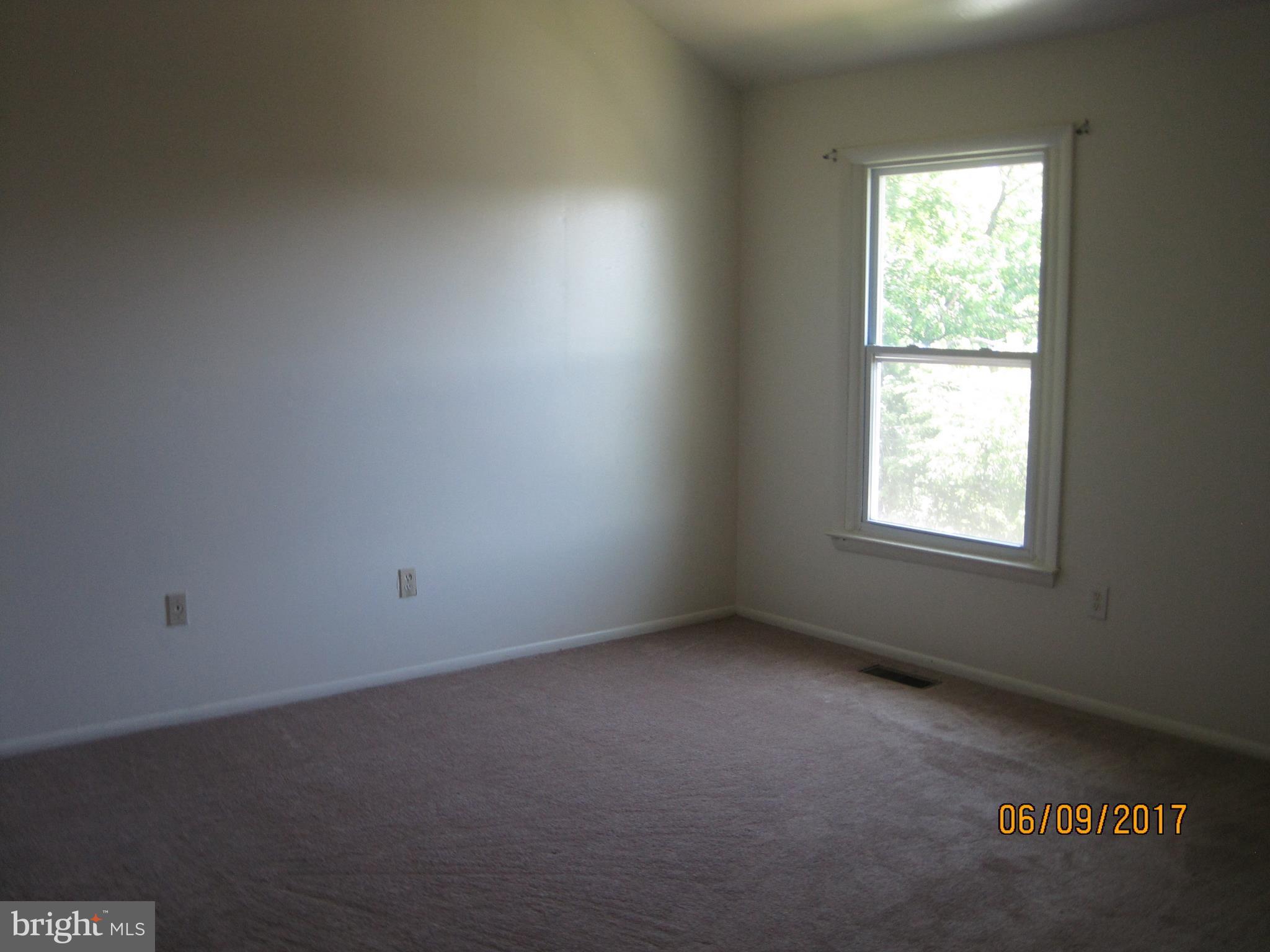 9640 Canterbury Riding, Unit 178 Laurel, MD 20723 - Photo 12 of 15 an empty room with a window
