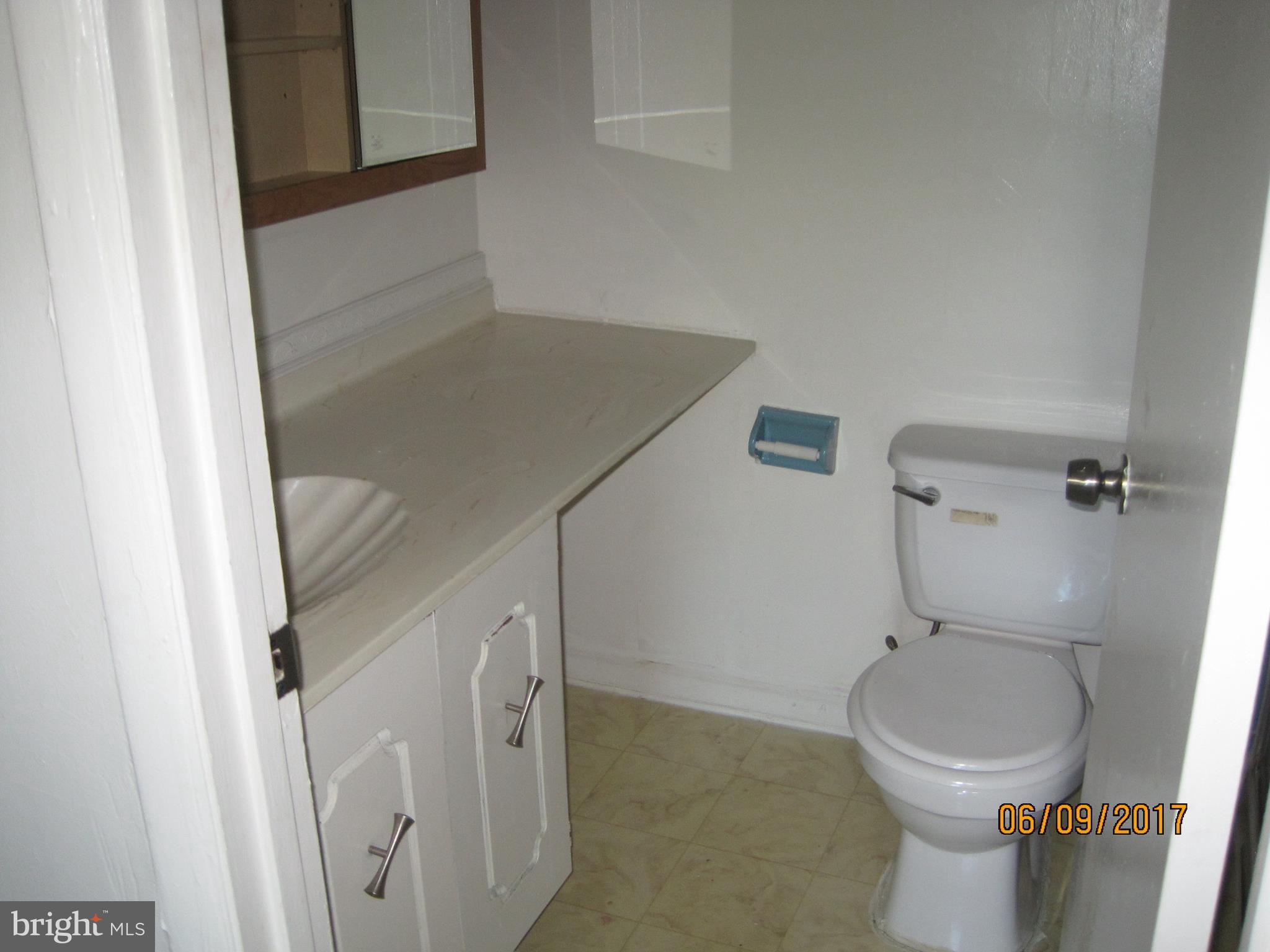 9640 Canterbury Riding, Unit 178 Laurel, MD 20723 - Photo 13 of 15 a bathroom with a toilet and a sink