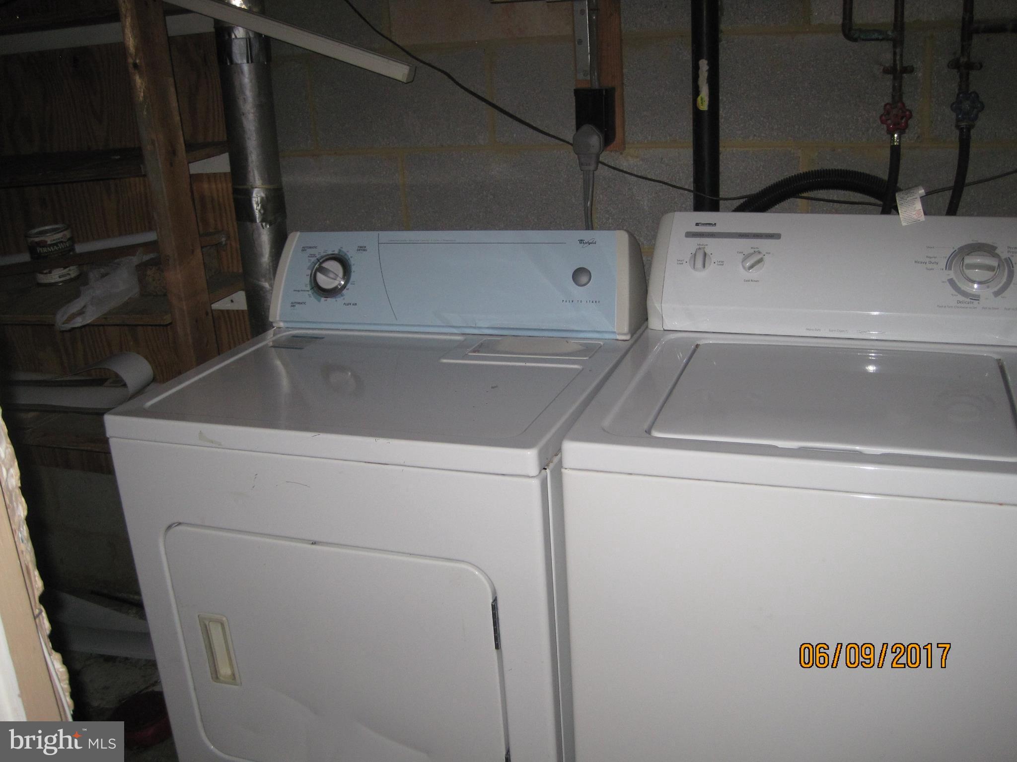 9640 Canterbury Riding, Unit 178 Laurel, MD 20723 - Photo 15 of 15 a utility room with dryer and washer