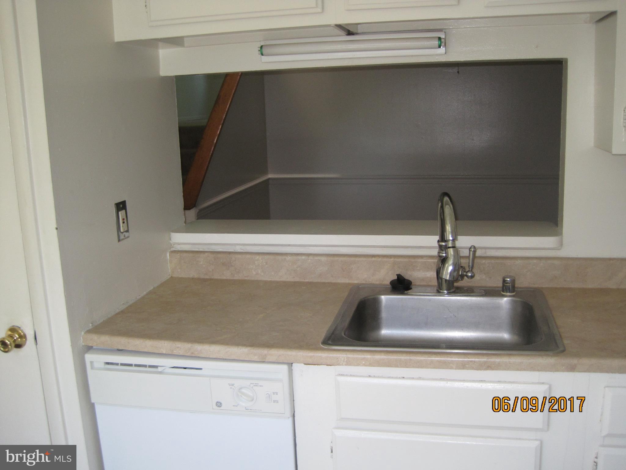 9640 Canterbury Riding, Unit 178 Laurel, MD 20723 - Photo 4 of 15 a close view of sink and cabinets
