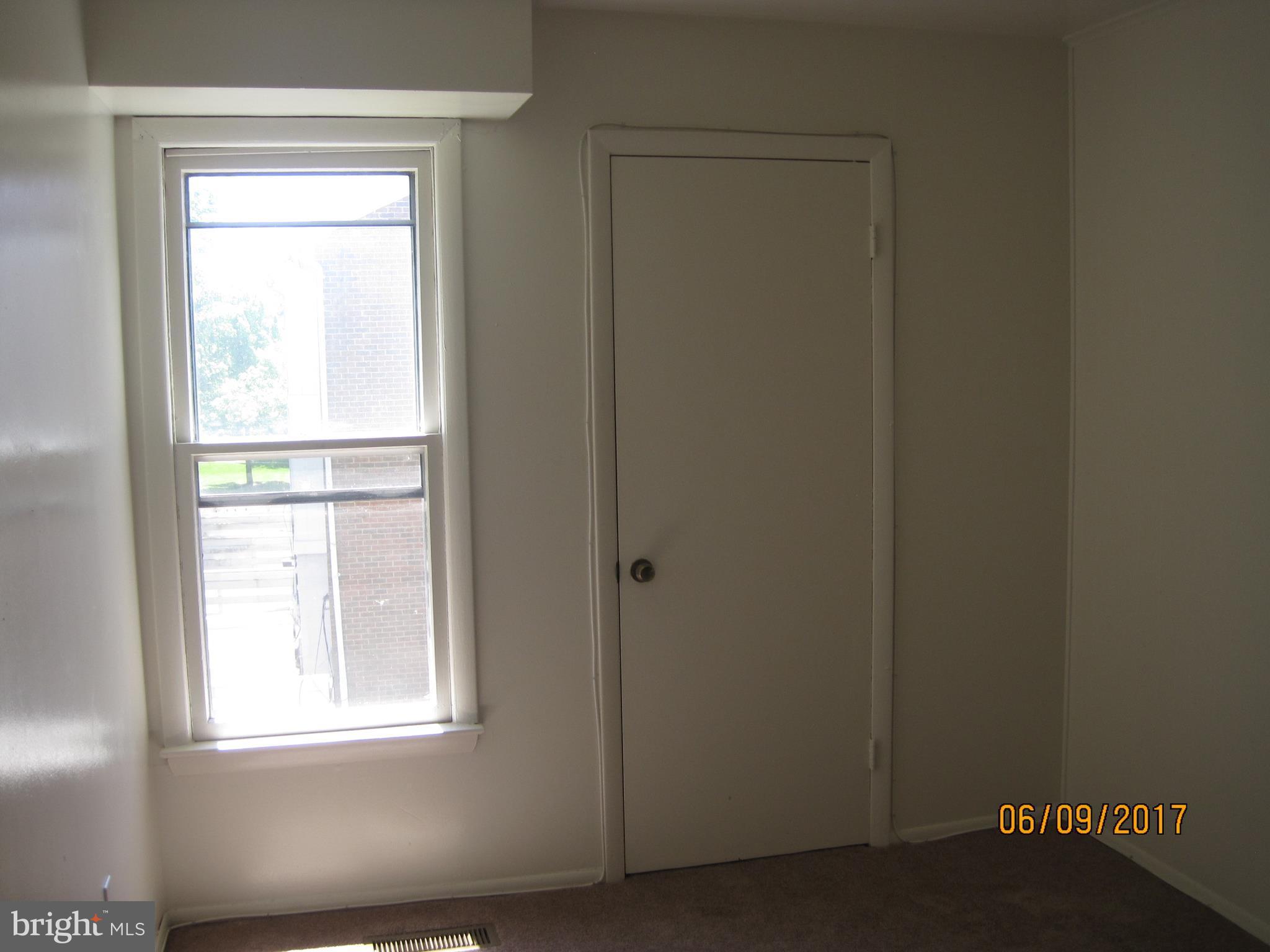 9640 Canterbury Riding, Unit 178 Laurel, MD 20723 - Photo 8 of 15 a view of an empty room with a window