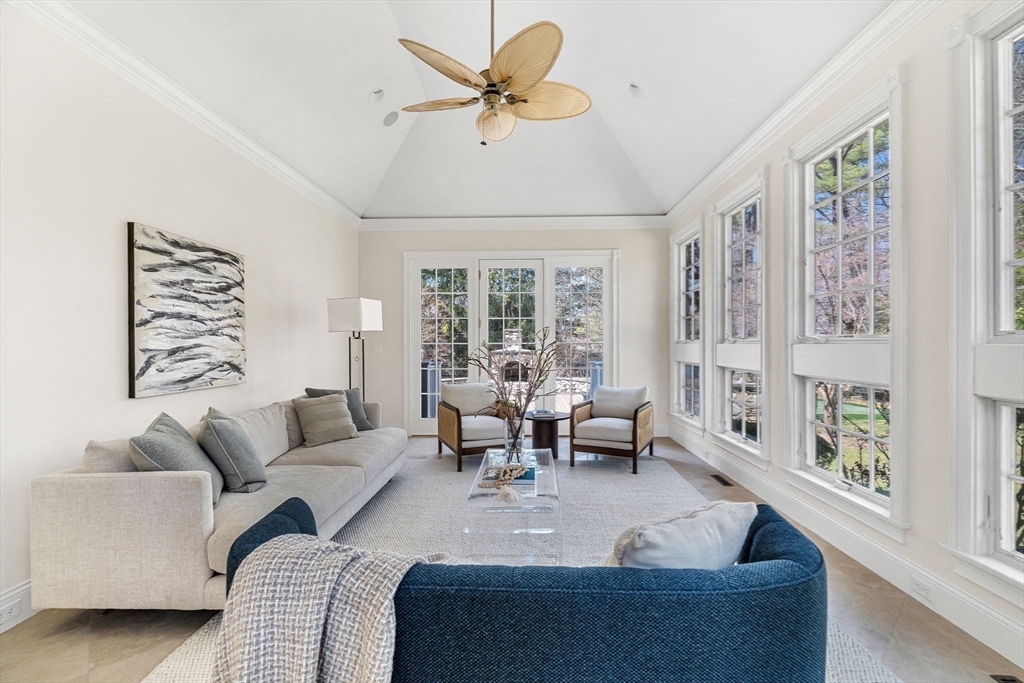 1 Stonefield Lane Wellesley, MA 02482 - Photo 12 of 30 a living room with furniture and large windows