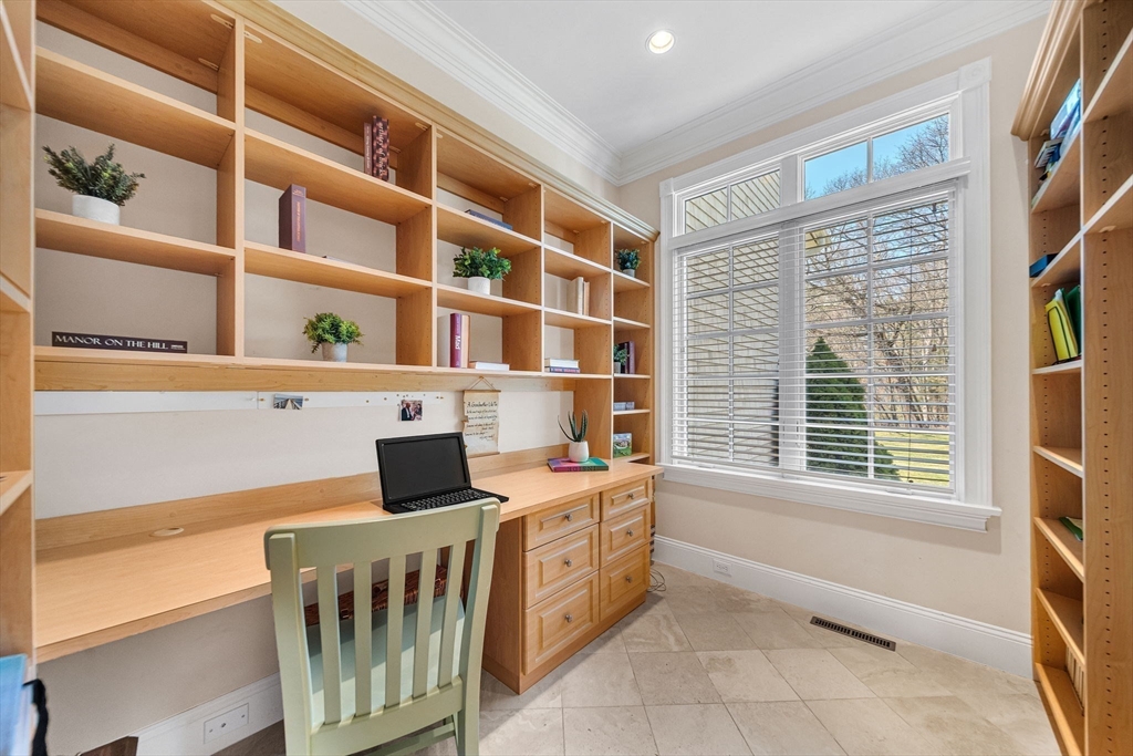 1 Stonefield Lane Wellesley, MA 02482 - Photo 22 of 30 a view of an empty room with a window
