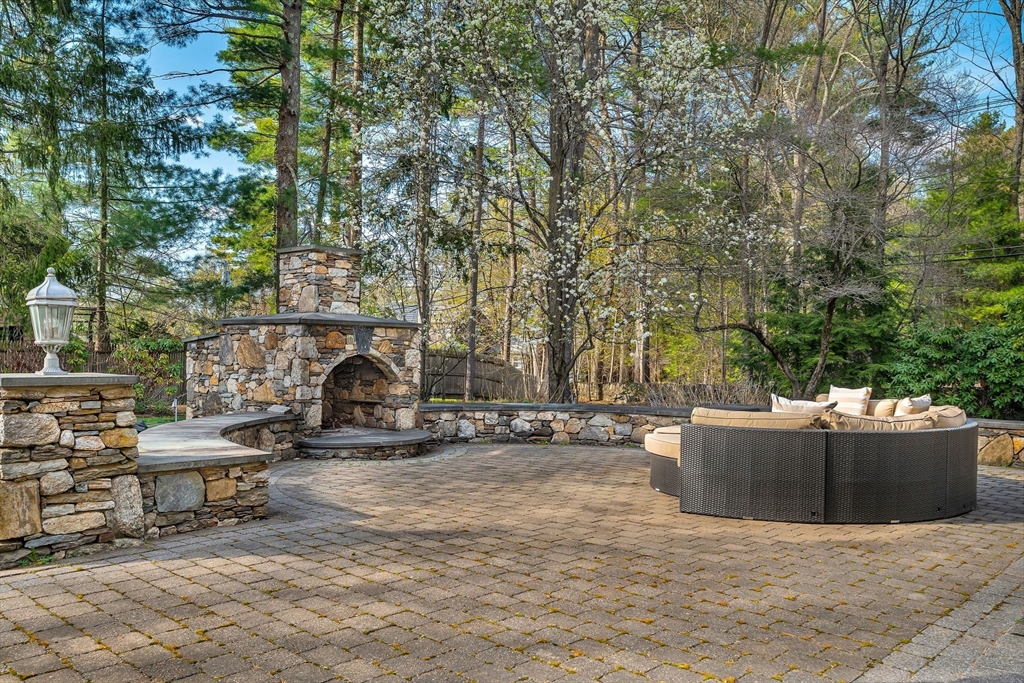1 Stonefield Lane Wellesley, MA 02482 - Photo 28 of 30 a view of backyard with seating space and trees