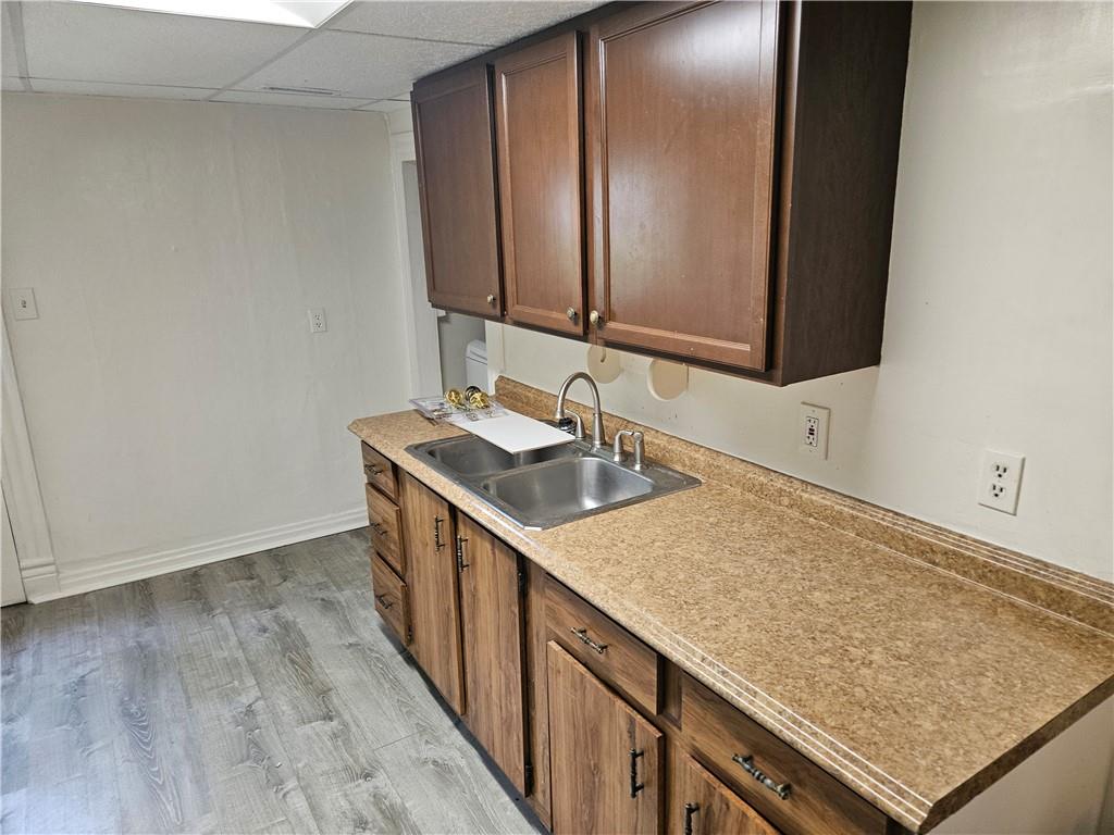 502 Center Avenue, Unit 2 Pitcairn, PA 15140 - Photo 11 of 28 a bathroom with a sink and a mirror
