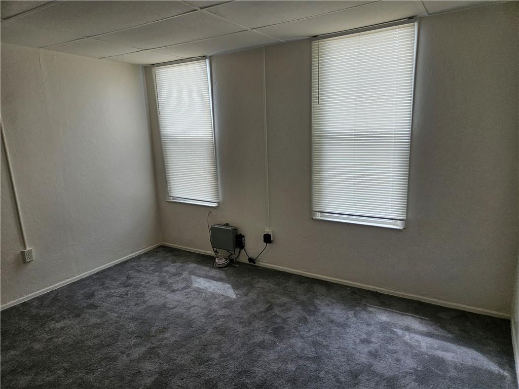 502 Center Avenue, Unit 2 Pitcairn, PA 15140 - Photo 16 of 28 an empty room with windows