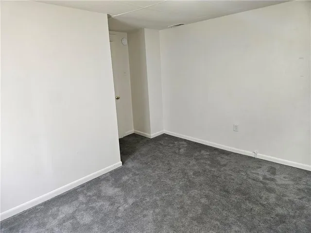 an empty room with a door