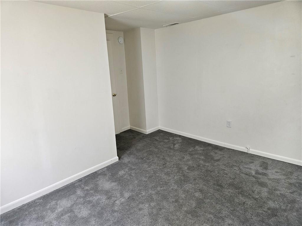 502 Center Avenue, Unit 2 Pitcairn, PA 15140 - Photo 22 of 28 an empty room with an entryway