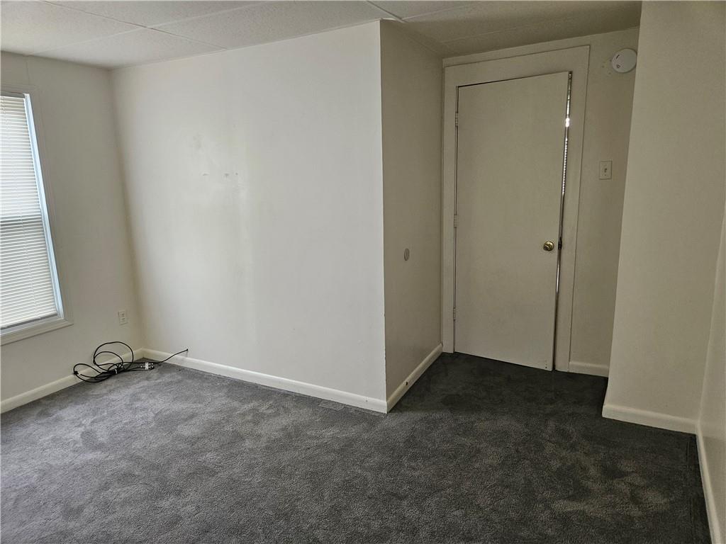 502 Center Avenue, Unit 2 Pitcairn, PA 15140 - Photo 23 of 28 an empty room with a door