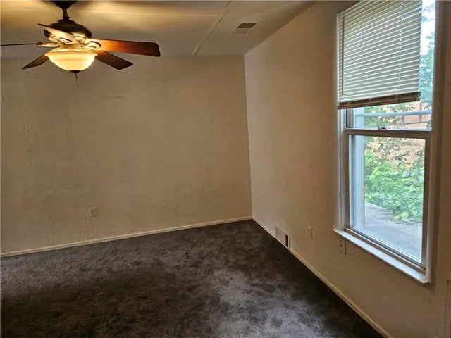 a view of a livingroom with a window