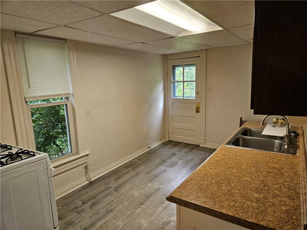 502 Center Avenue, Unit 2 Pitcairn, PA 15140 - Photo 10 of 28 a bedroom with a bed and a window