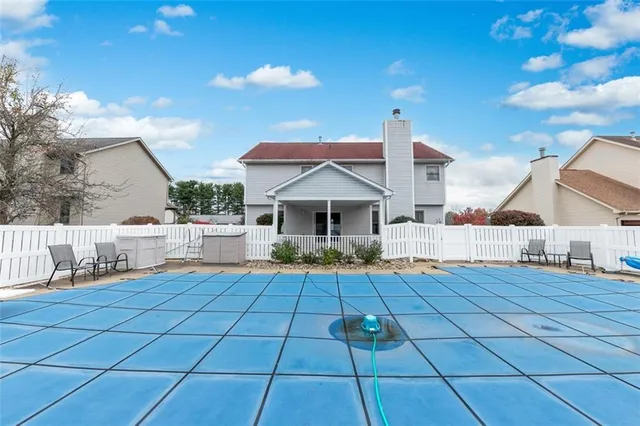 a front view of a house with yard