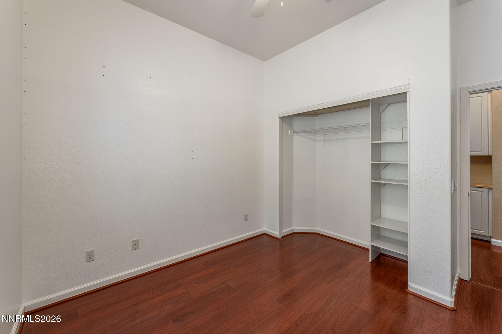 1840 Hunter Creek Road Reno, NV 89519 - Photo 25 of 39 a view of an empty room with wooden floor and closet