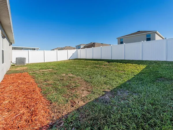 a house view with a garden space