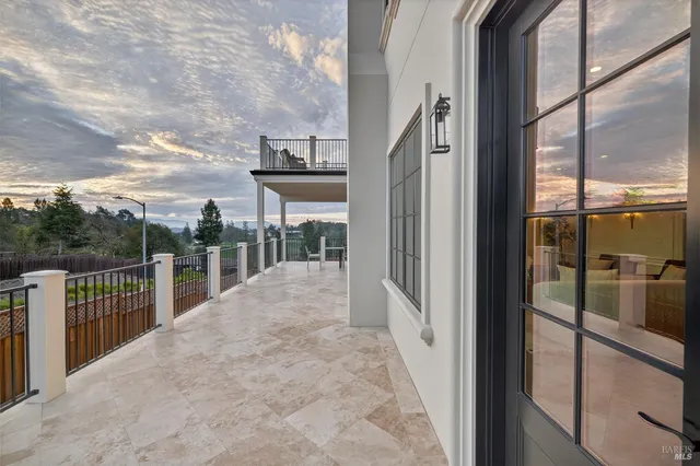 a living room with furniture and windows