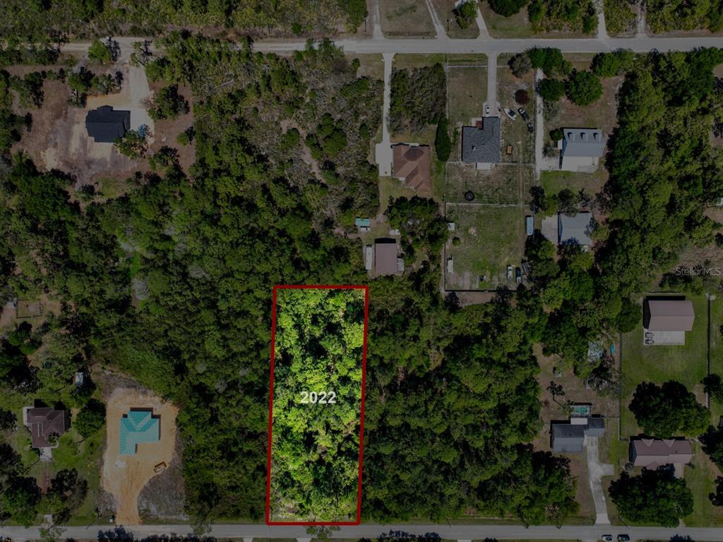 2022 Flower Terrace Sebring, FL 33875 - Photo 23 of 60 an aerial view of a house with a yard