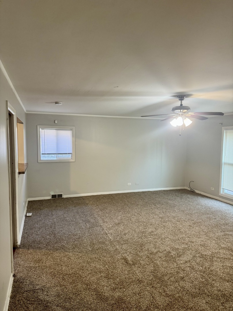 1212 East 151st Street Dolton, IL 60419 - Photo 3 of 24 a view of an empty room