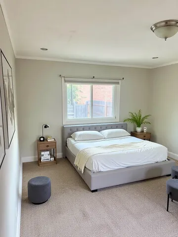 a bathroom with a shower and a sink