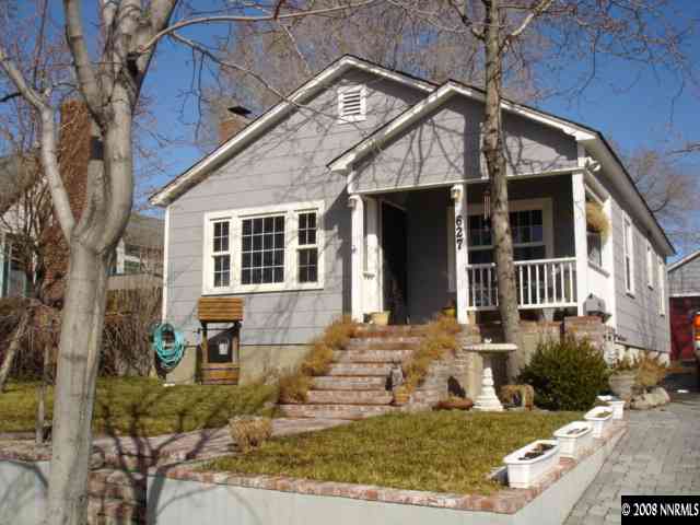 627 Roberts Street Reno, NV 89502 - Photo 1 of 5 front view of a house with a yard