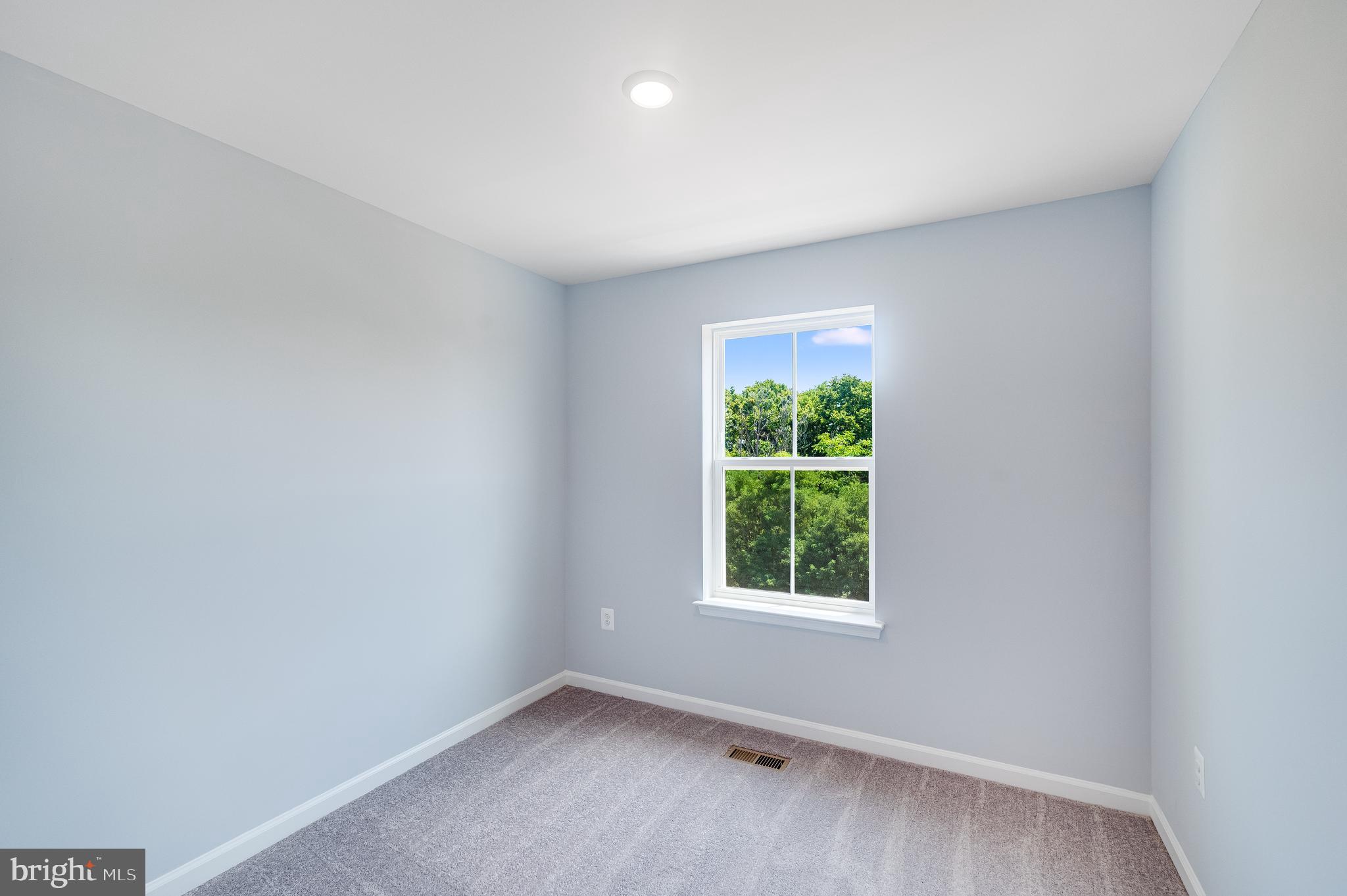 68 Gray Silver Road Inwood, WV 25428 - Photo 19 of 28 an empty room with a window
