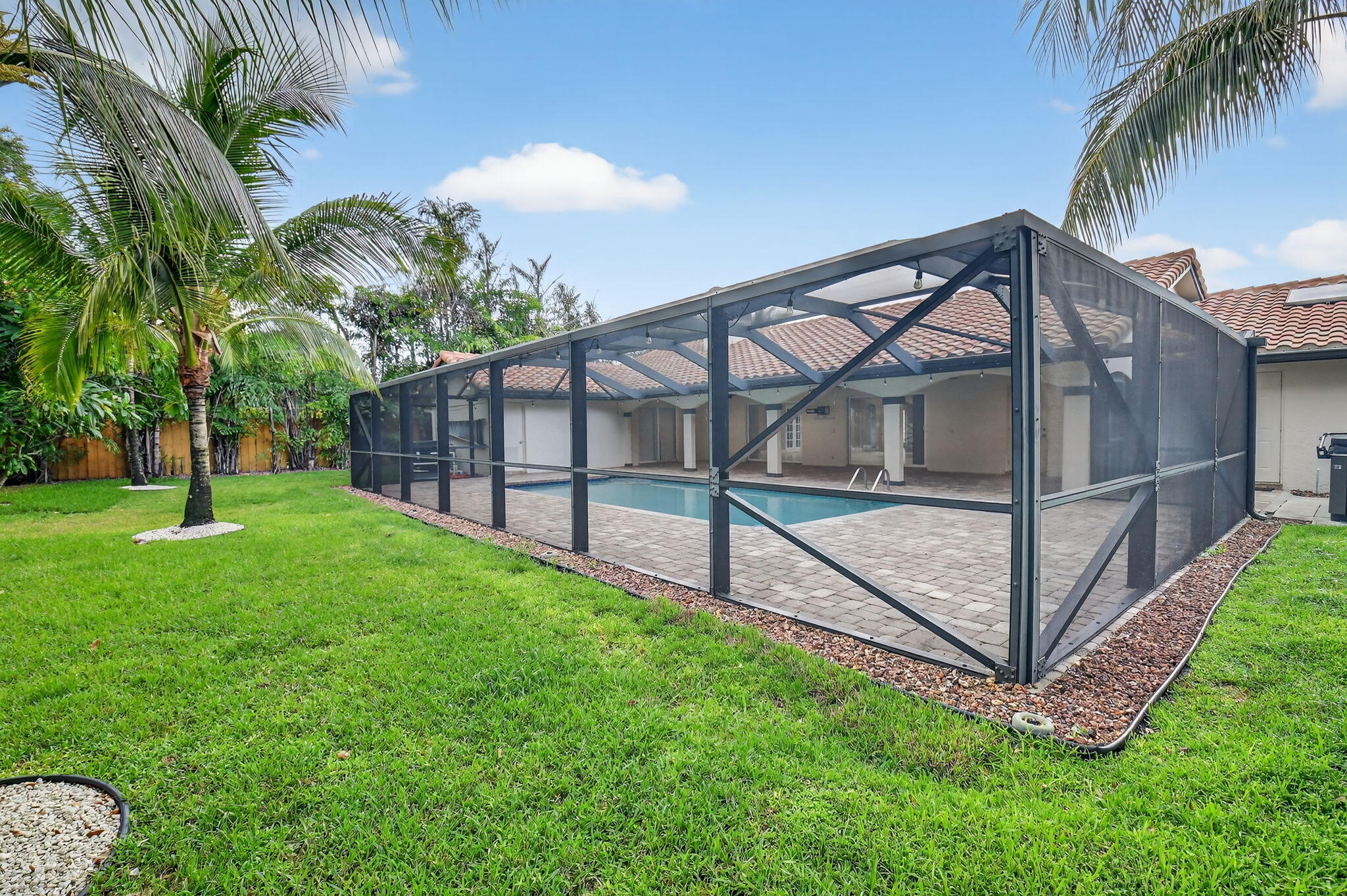 360 Northwest 53rd Street Boca Raton, FL 33487 - Photo 16 of 72 a view of outdoor space and yard