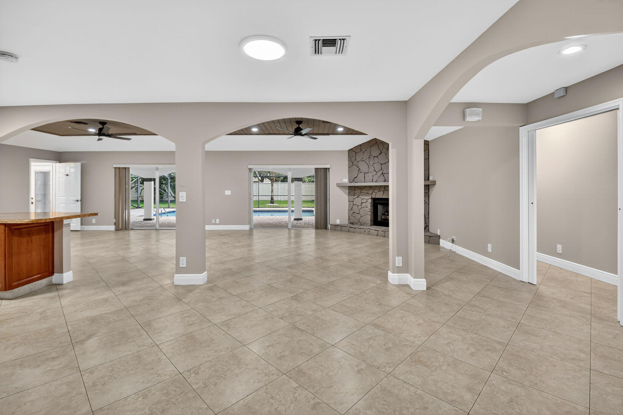 360 Northwest 53rd Street Boca Raton, FL 33487 - Photo 22 of 72 a view of a livingroom with a furniture and a fireplace