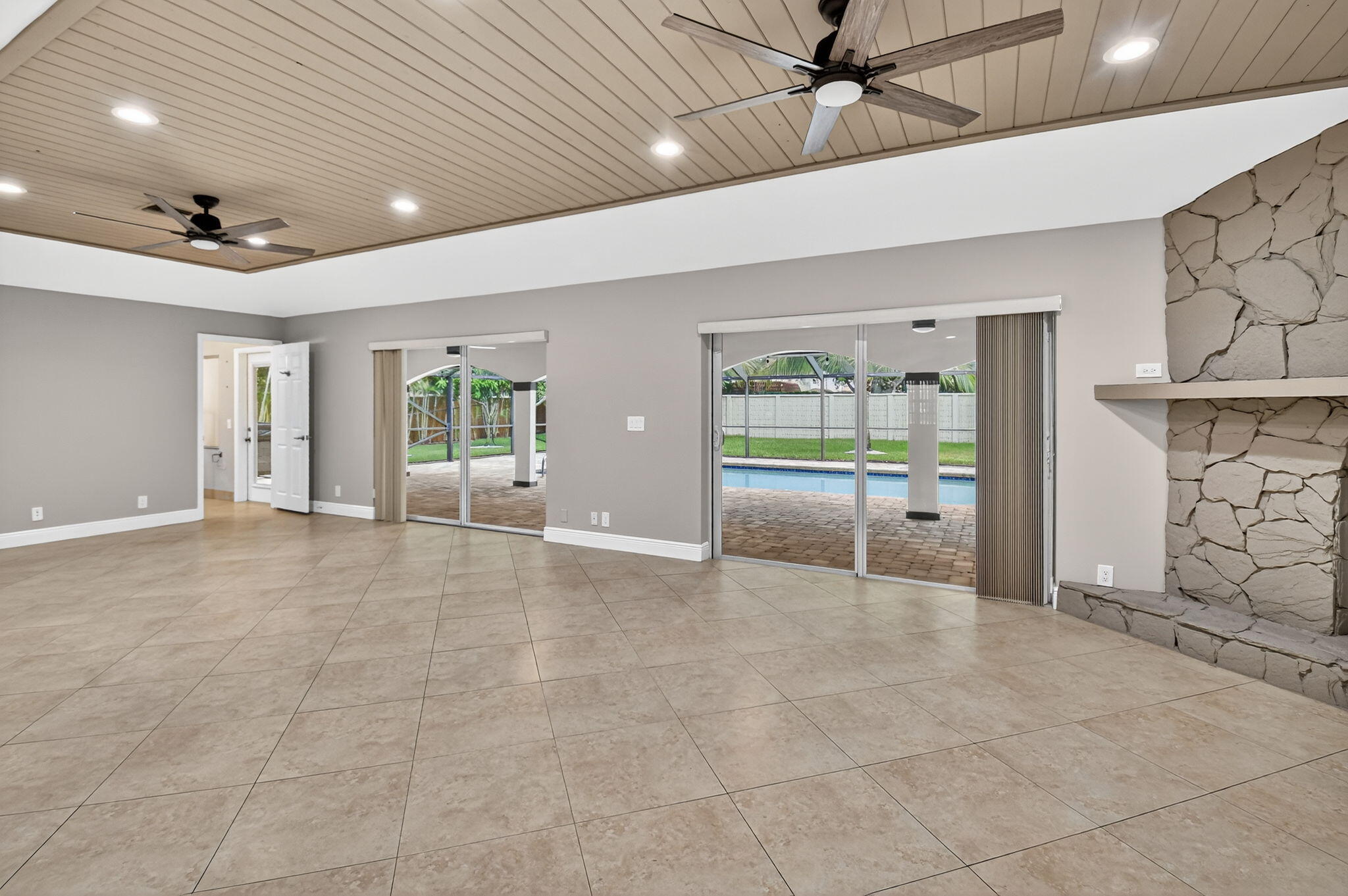 360 Northwest 53rd Street Boca Raton, FL 33487 - Photo 28 of 72 a view of an empty room with a window