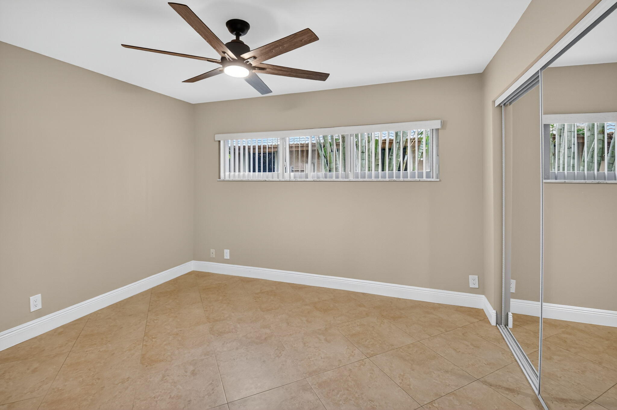 360 Northwest 53rd Street Boca Raton, FL 33487 - Photo 42 of 72 a view of an empty room