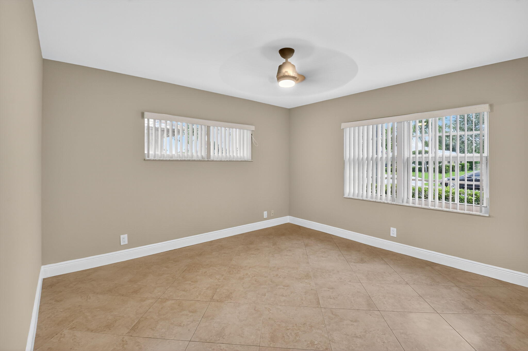 360 Northwest 53rd Street Boca Raton, FL 33487 - Photo 47 of 72 a view of an empty room with a window
