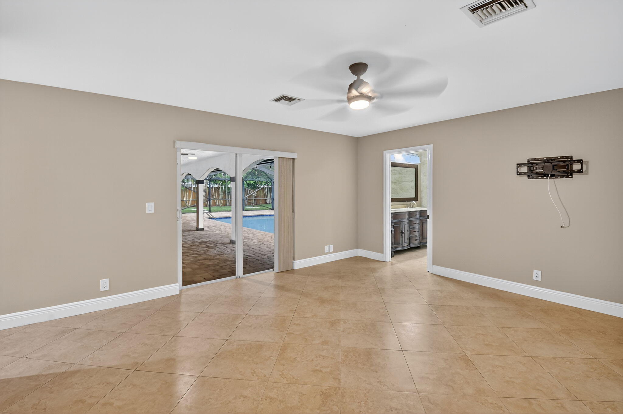 360 Northwest 53rd Street Boca Raton, FL 33487 - Photo 52 of 72 a view of an empty room with a window