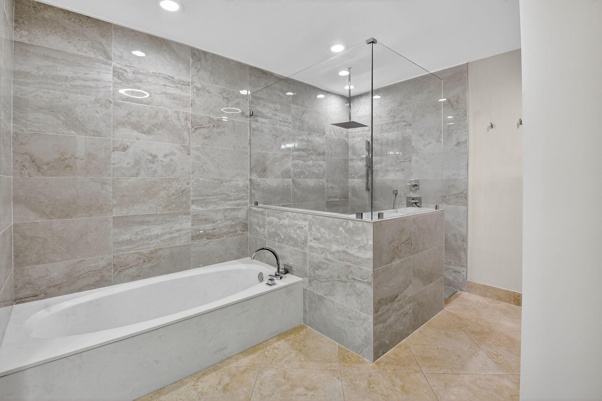 360 Northwest 53rd Street Boca Raton, FL 33487 - Photo 54 of 72 a bathroom with a bathtub and a shower